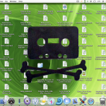 Apple screen covered with mp3 files superimposed with cassette tape skull and  crossbones