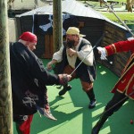 Pirates fighting on a ship deck