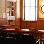 A court room with a PPI logo photoshoped onto the back wall